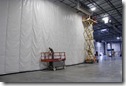Warehouse divider curtain wall with doors