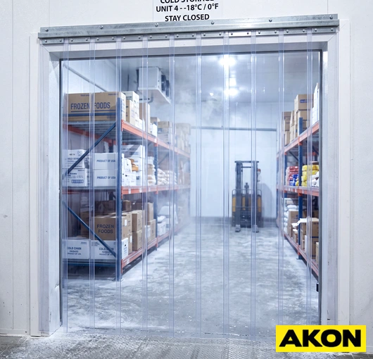 PVC strip curtain installed at a cold storage facility doorway to retain refrigerated air.