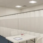 Pop-Up medical labs, testing stations, and isolation areas with curtain walls featuring white and clear panels, folding tables, chairs, and medical testing supplies