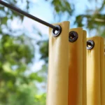 deck-curtains-with-grommets-mounted-on-pipe-track