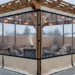 Beige-trimmed pergola enclosure with clear vinyl panels, highlighting how to seal pergola corners and gaps for a tight winter fit