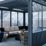 Covered deck with Roll-up Clear Patio Curtains – Keep Your View in Winter, showing a fire pit and wicker chairs in snowy weather