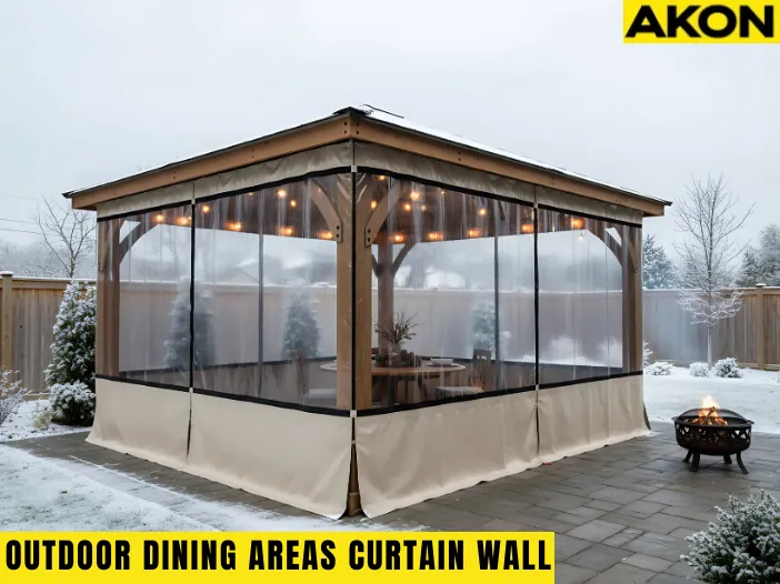 Insulated Curtain Walls for Outdoor Dining Areas in the Winter enclosing a cozy patio with clear vinyl panels, keeping the space warm and protected from snow