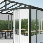 Modern pergola with white vinyl curtains and clear windows for Pergola Draft-Proofing Stop Wind Whistle Without Losing Light, offering flexible seasonal protection