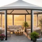 Round pergola enclosure with clear vinyl panels at sunset – Pergola Enclosures vs. Permanent Walls – Flexibility and Resale Value