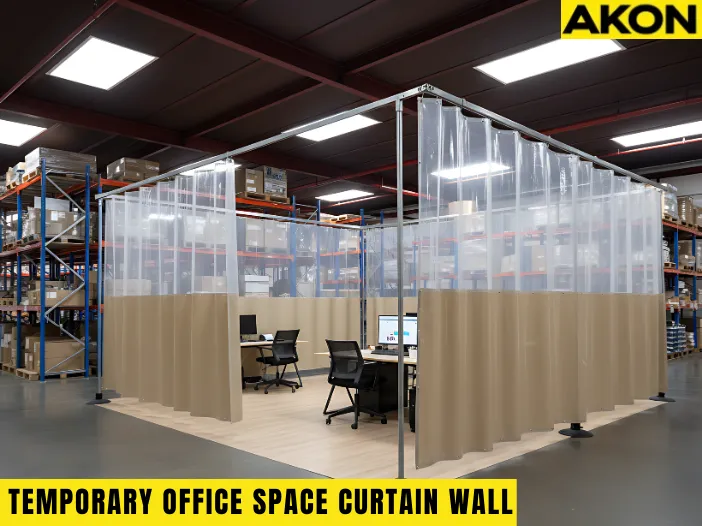 Temporary office space inside warehouses using curtain wall systems with clear PVC panels and opaque vinyl dividers creating a private workspace