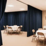 Using curtain walls to create privacy zones in large churches or event halls, showing how fabric partitions divide seating areas for worship, fellowship, or cafeteria spaces