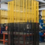 Yellow and black plasma burn table enclosure using welding curtains for safe containment Plasma Burn Table Enclosures Containment with Welding Curtains
