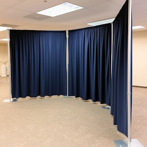 pipe and drape hardware with curtain