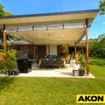 Weatherproof porch panels installed on an outdoor porch to block wind, rain, and cold across all four seasons.