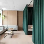 Echo Reducing Curtains creating private seating zones in a professional commercial space