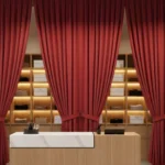 Elegant red Retail Storage & Clutter-Hiding Curtains adding privacy and style behind a retail counter display