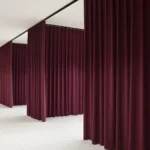 Elegant white Fabric Hallway Divider Curtains separating hallways in a modern building, enhancing privacy and organization