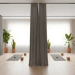 Light gray Yoga & Wellness Zone Divider Curtains creating private yoga zones in a relaxing studio with yoga mats and plants