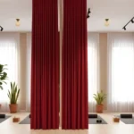 Red Yoga & Wellness Zone Divider Curtains dividing space in a yoga studio with natural light and calming decor