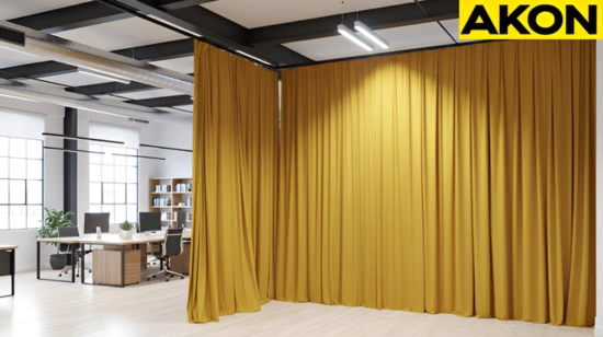 Floor-to-ceiling fabric divider curtains creating a flexible partition in an open loft office environment