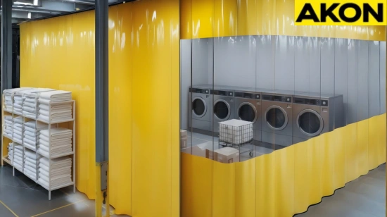 Industrial curtain wall creating a durable enclosure for a shared laundry room