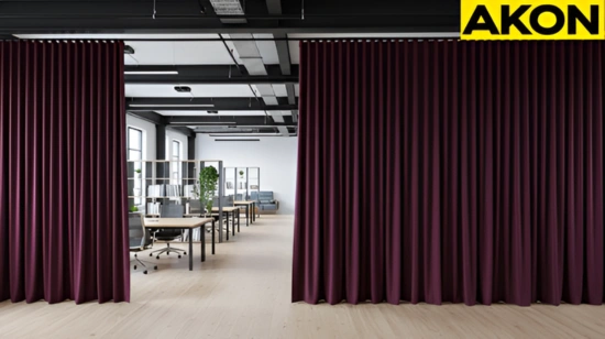 Premium fabric loft divider curtains defining a workspace inside a modern industrial studio