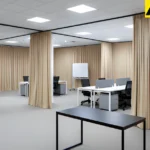 Temporary office buildout using fabric partition curtains for flexible layouts