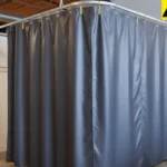 Vinyl industrial divider curtain creating a temporary enclosed area inside a boutique loft space