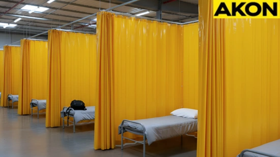 Yellow curtain dividers creating individual sleeping spaces in shared housing