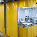 Partition curtains creating temporary workspaces in an open office buildout