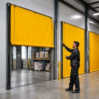 Commercial roll up dock curtains installed at a loading dock doorway to control temperature and block drafts.