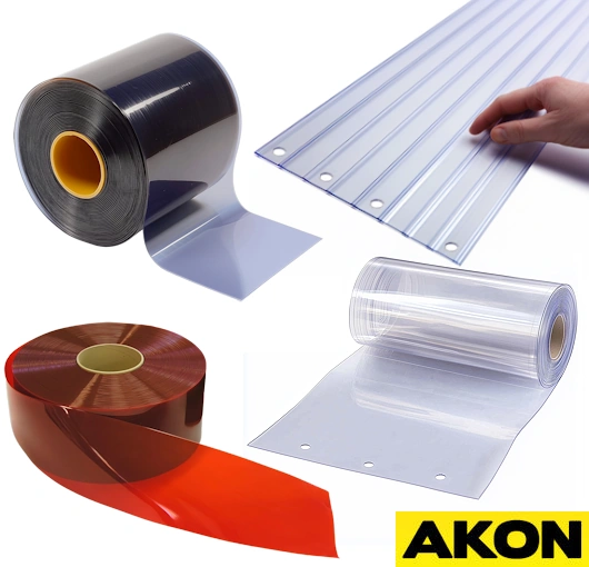 Bulk rolls of replacement PVC strip curtain material stacked and ready for cutting to length in an industrial setting.