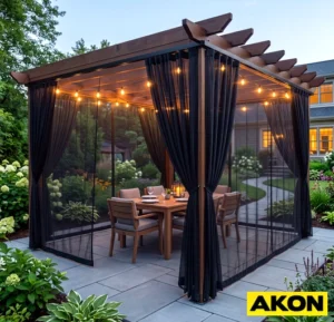 Black mosquito curtains hung on a pergola and tied back to allow open access to the outdoor space.
